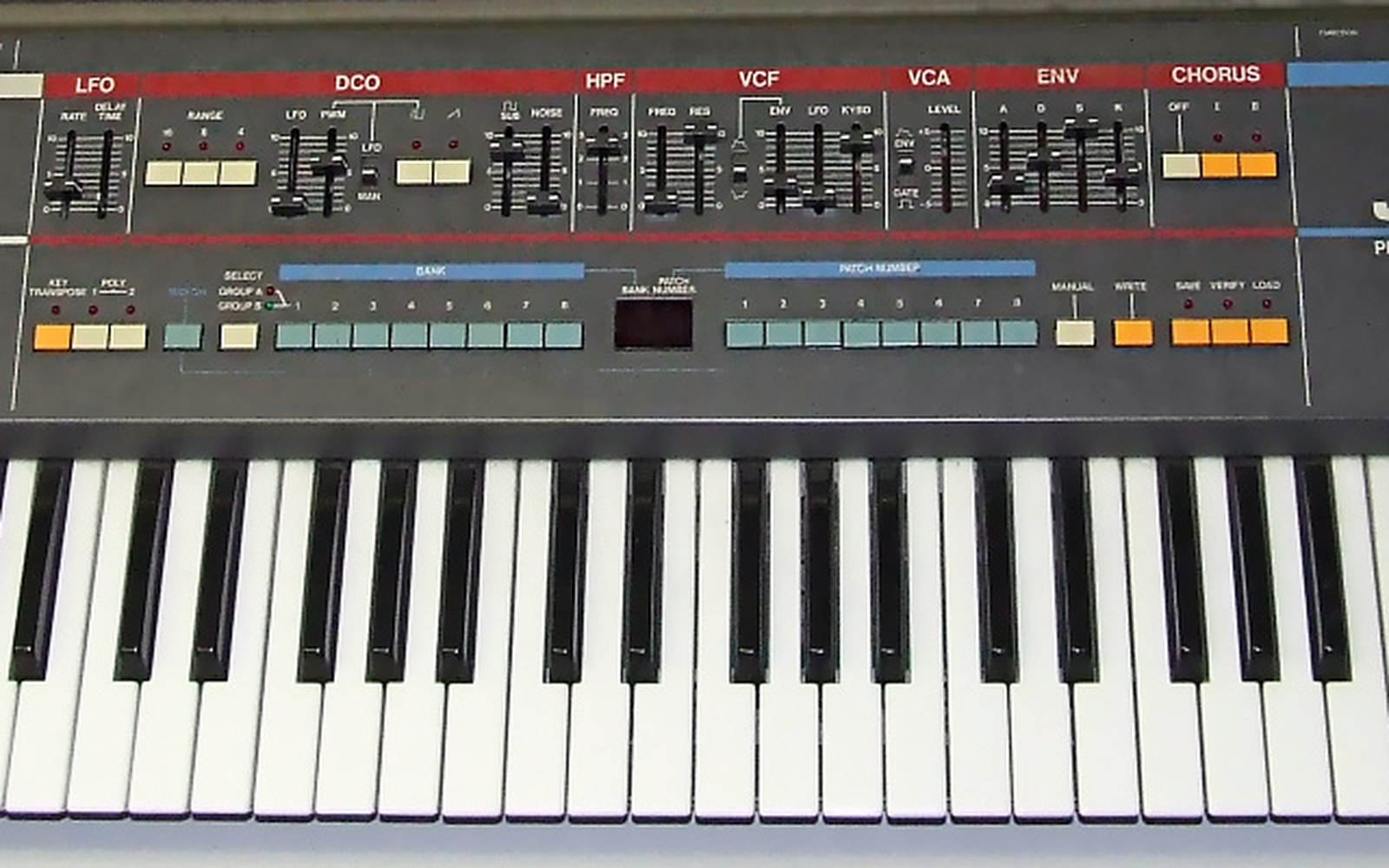 Roland Juno-106 synthesizer keyboard with labeled sliders for LFO, DCO, VCF, and chorus sections